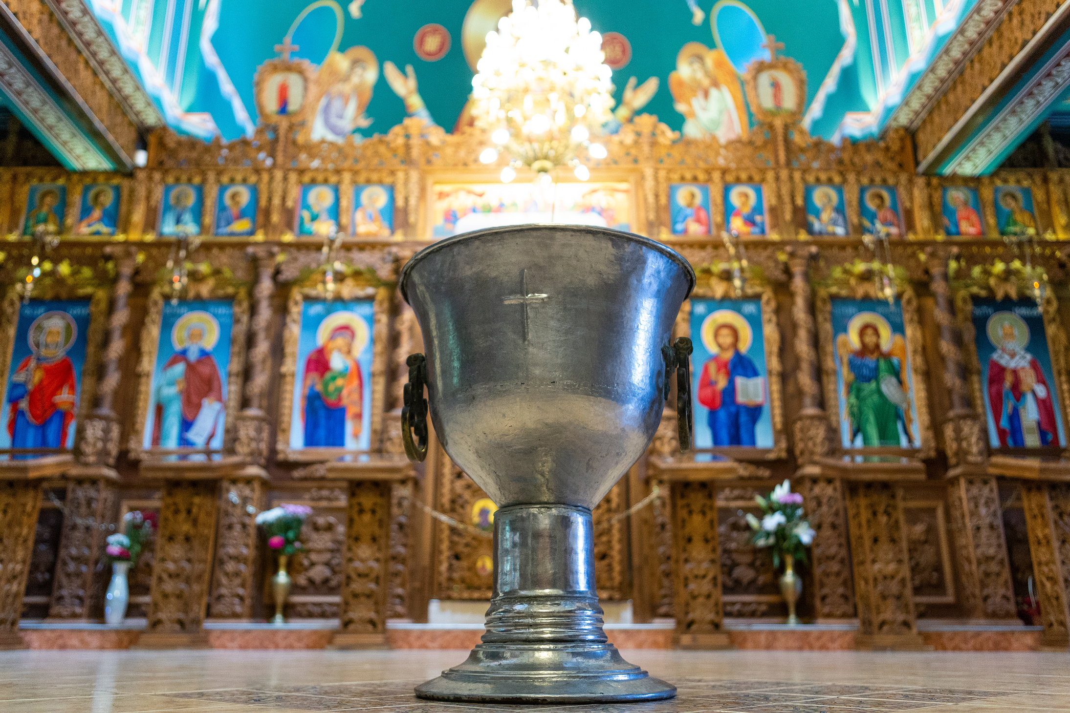 a pot of water in which the child to be baptized is immersed.